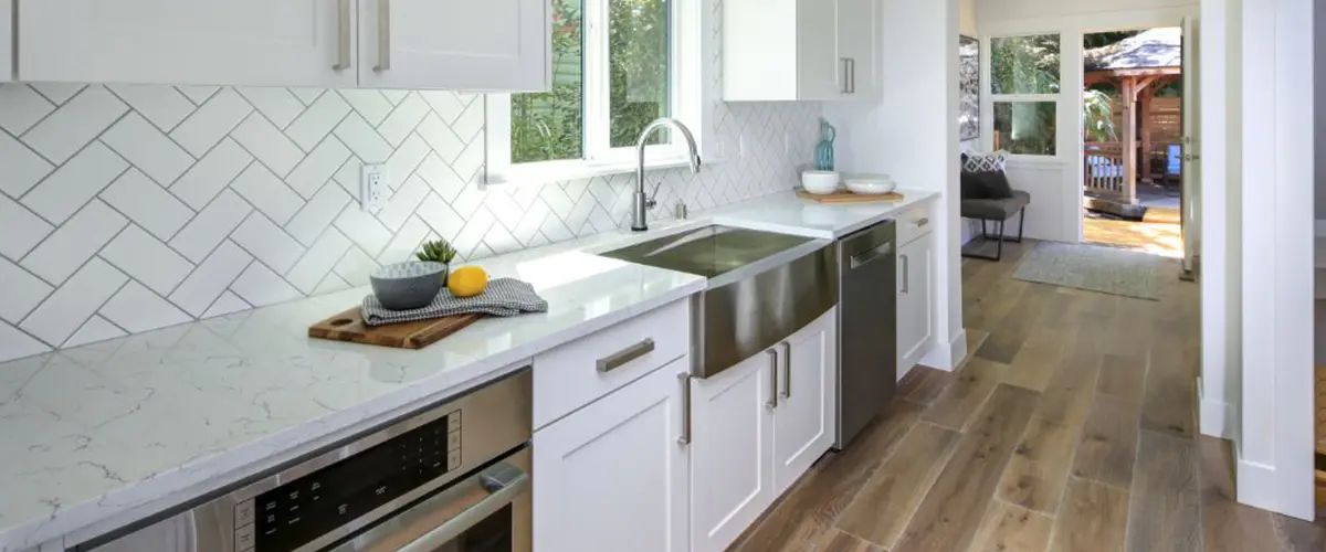 kitchen with white countertop and tile