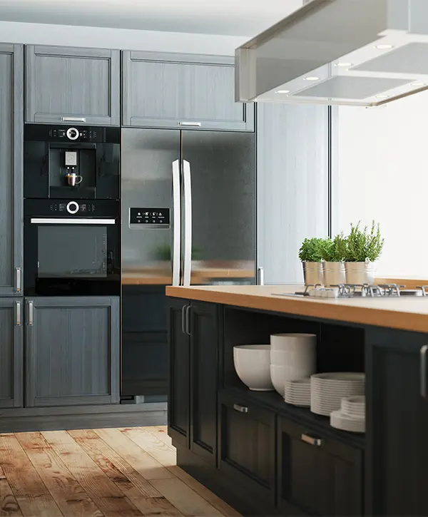Black kitchen cabinets with plants and wood countertops