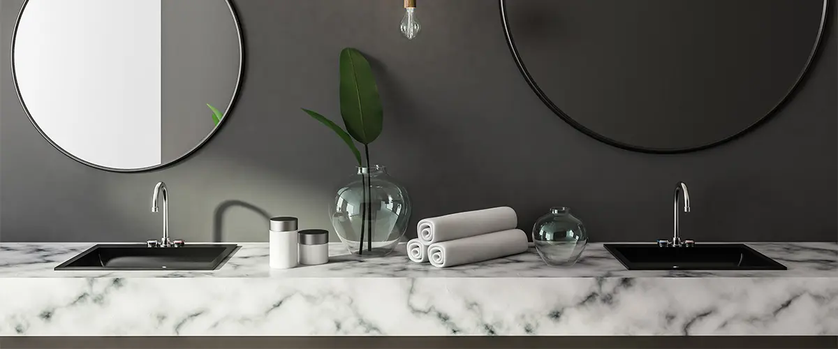 marble counter with black backsplash
