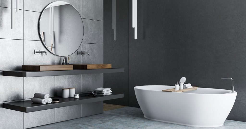 A black bathroom with an elegant minimalist vanity