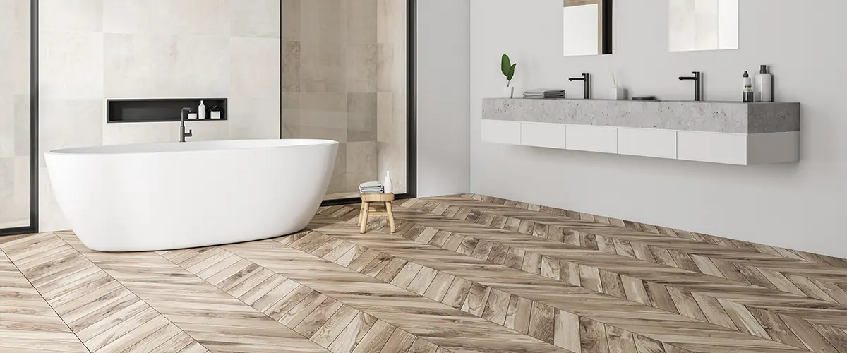 Wood flooring with freestanding tub and simple vanity