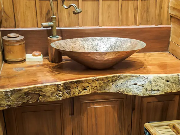 A vanity countertop made of real wood