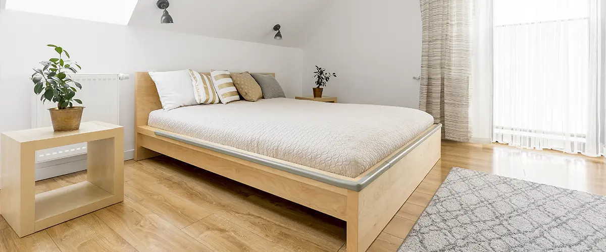 Bedroom addition with wood features and carpet