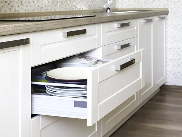white cabinet drawers by Pellak Construction