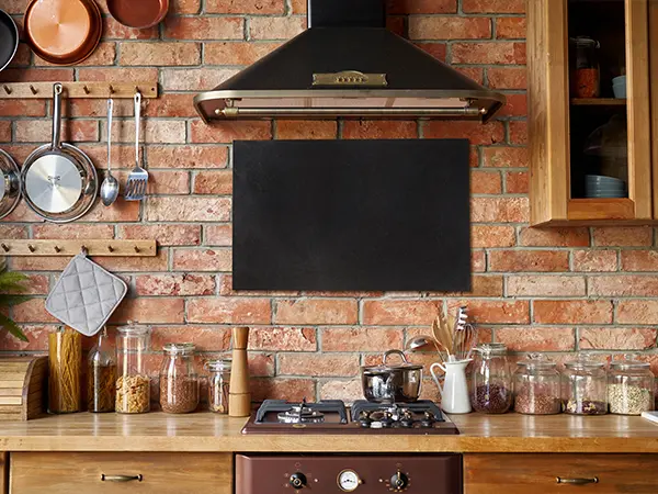 traditional kitchen design with brick backsplash and