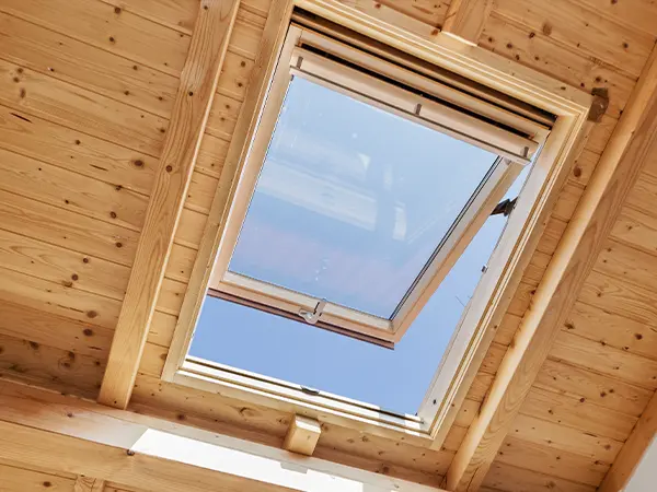 Wood frame window on ceiling