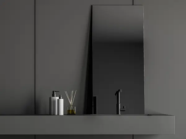 A black bathroom countertop