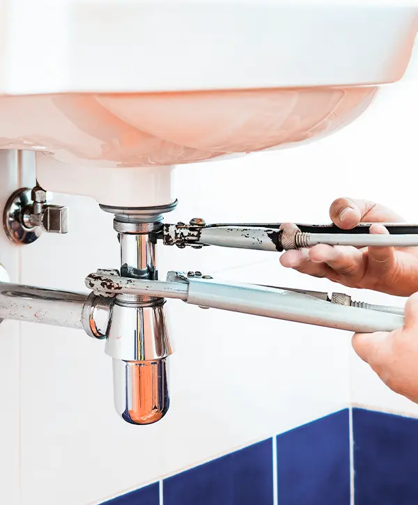Worker Installing Bathroom Sink In Pennsylvania Springfield