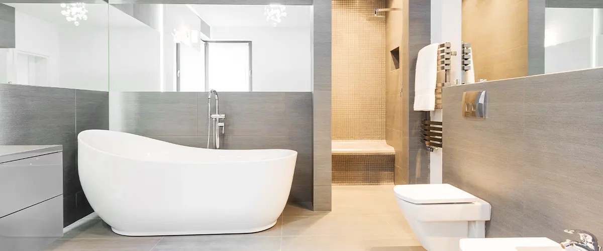 Modern Bathroom with Freestanding bath by Pellak Construction