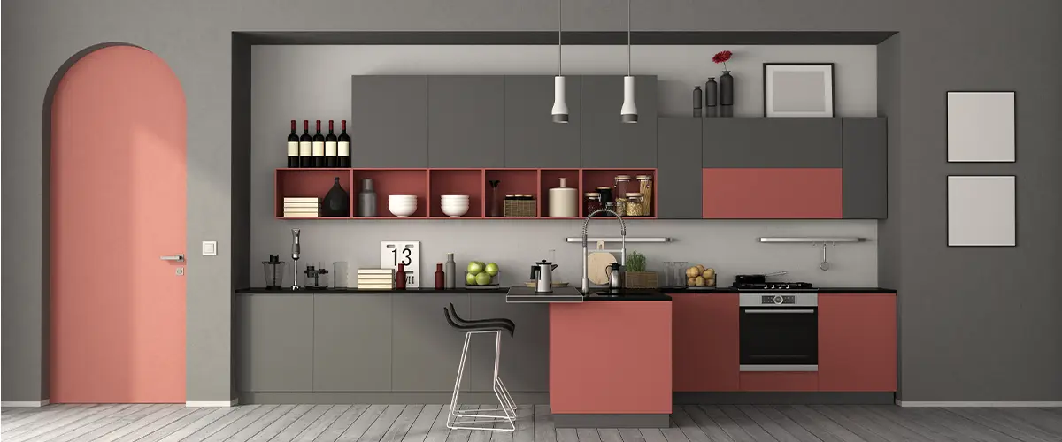 Modern upscale kitchen with grey and red cabinets.
