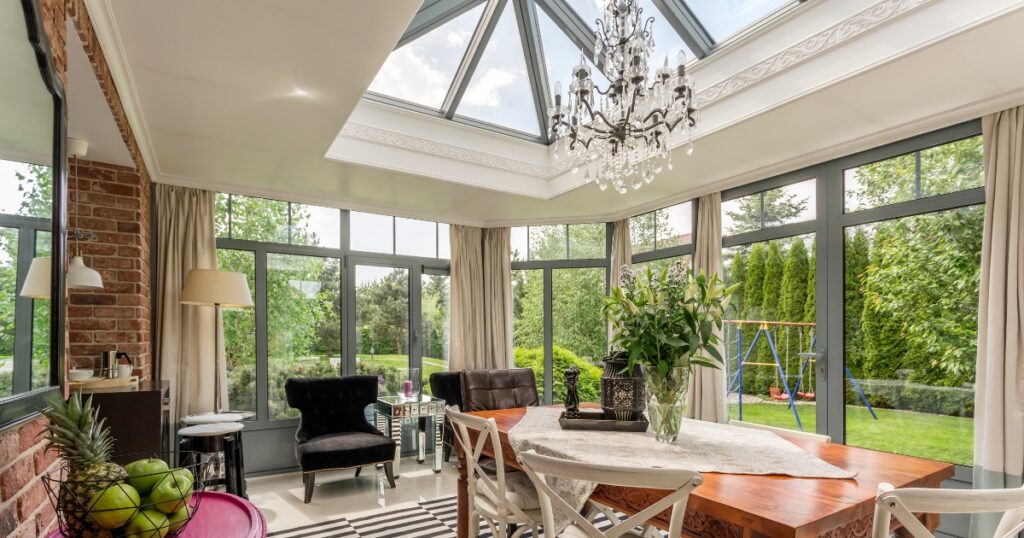 image of a spacious sunroom with lot of windows