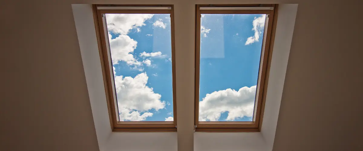 Skylight Installation In Springfield. View from the window. View of the sky from the window. Window on the roof.