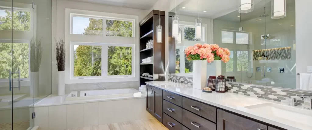 luxurious-bathroom-with-dark-wood-vanity-and-large-mirror