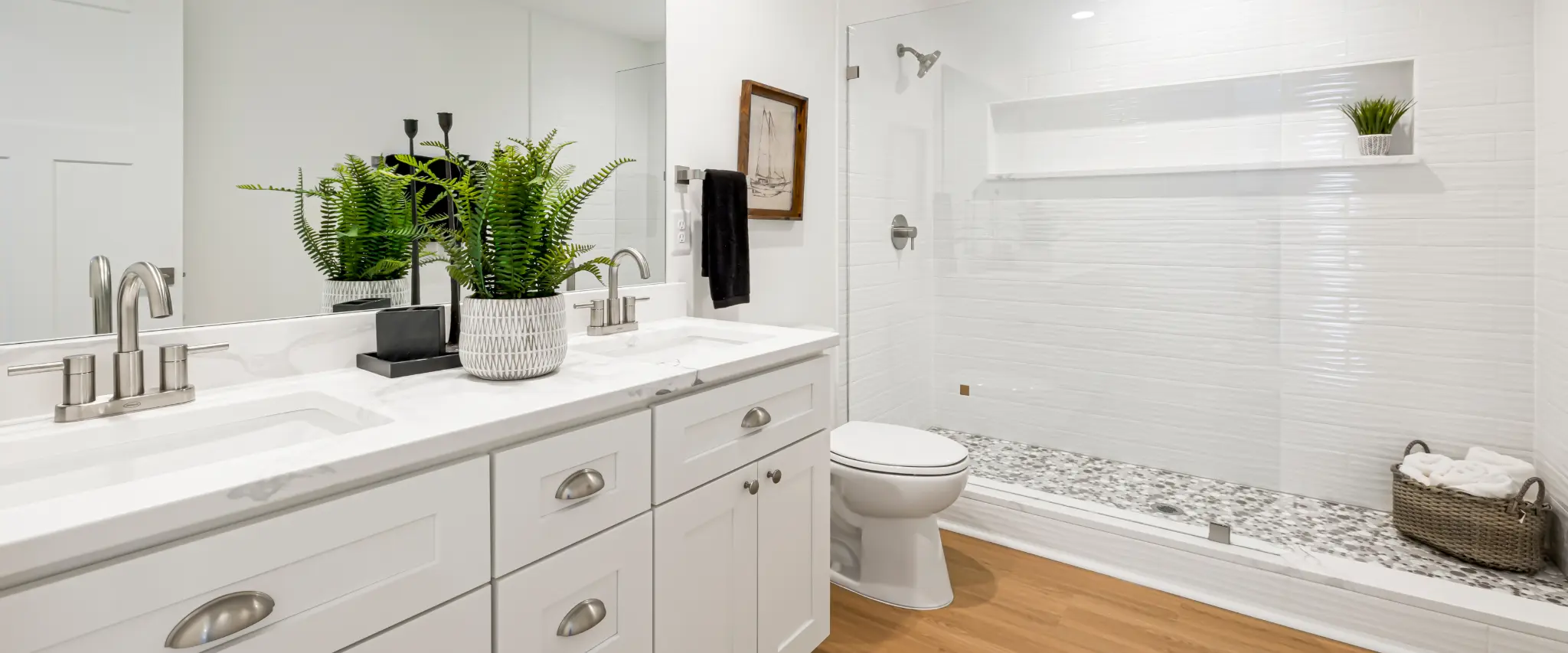 Serene spa-inspired bathroom with a white freestanding bathtub and natural decor